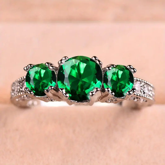 Argent Émeraude Three-Stone Bague